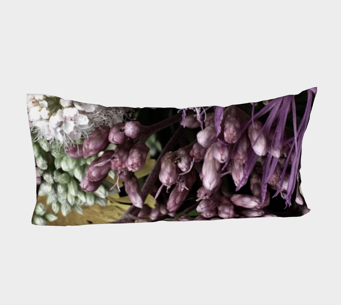 Bed of Flowers pillow sleeve side view showing cascading purple hyacinth blooms, white starburst flowers, pale green buds, and deep purple leaves across the full length
