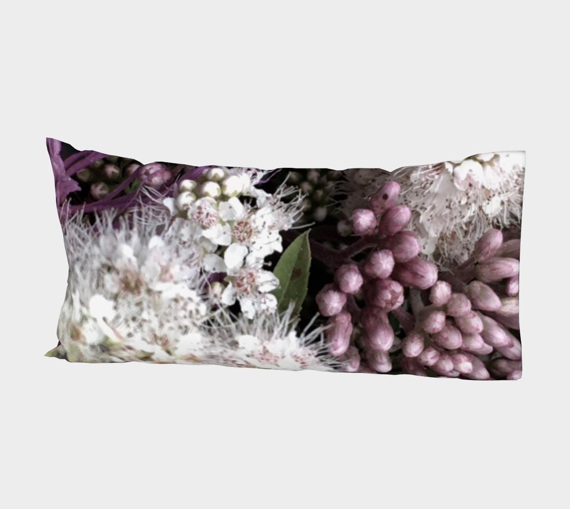Bed of Flowers pillow sleeve showing full composition with purple hyacinth clusters, white starburst flowers with delicate stamens, and olive green leaves on black background
