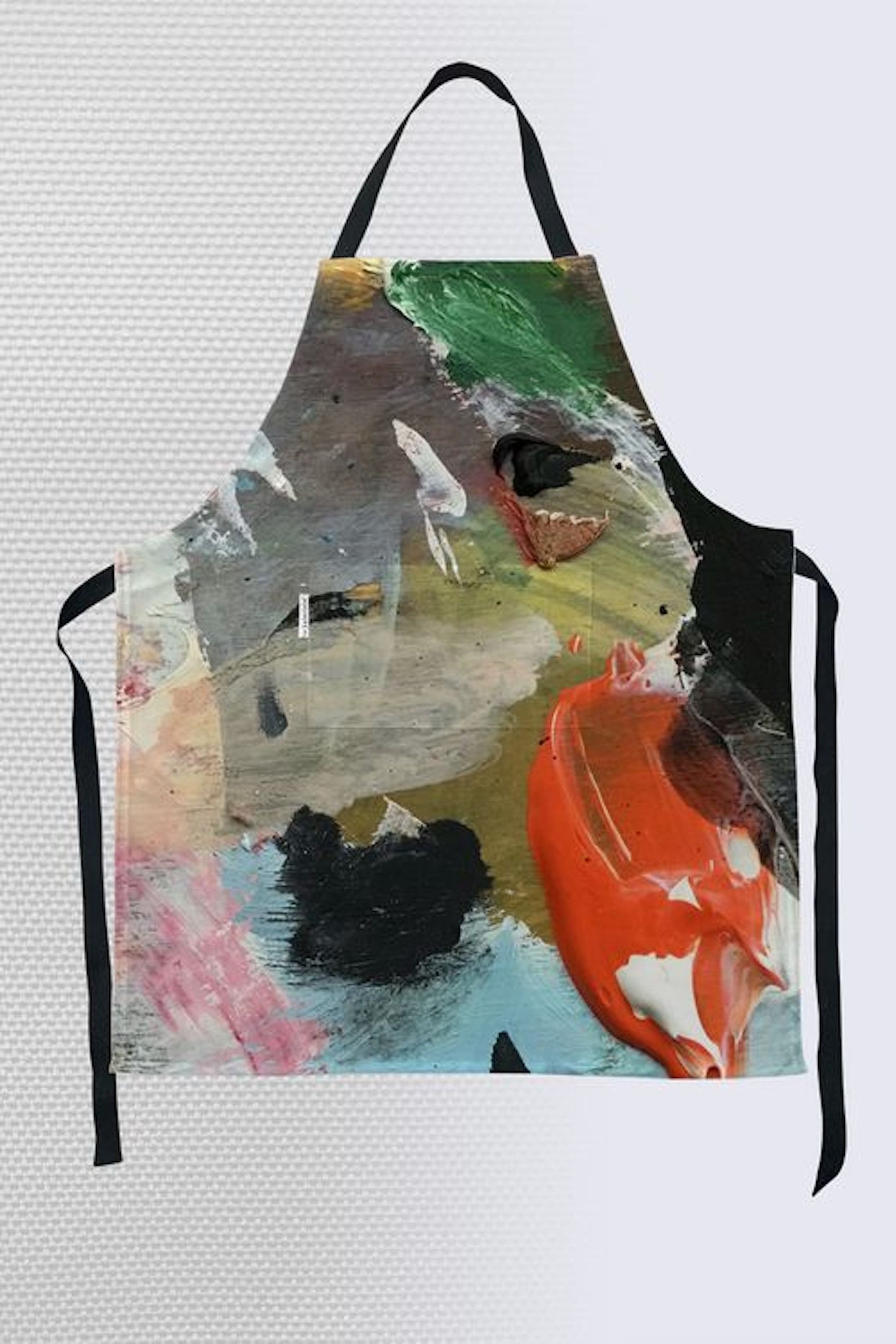 Abstract impressionist art apron with bold orange, emerald green, and gray brushstrokes on textured palette knife painting with black straps and front pocket
