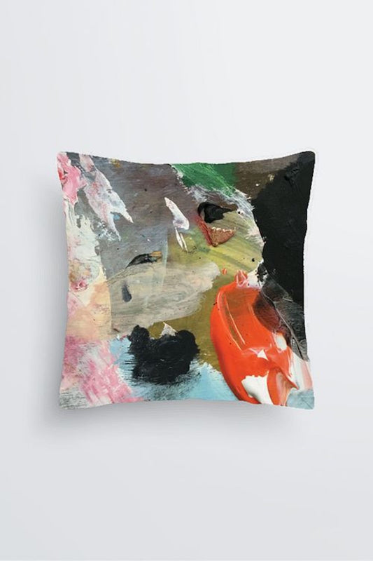 Pinnacle abstract art accent cushion featuring bold coral-orange brushstroke, soft pinks, emerald green, charcoal black, and pale blue on textured gray background